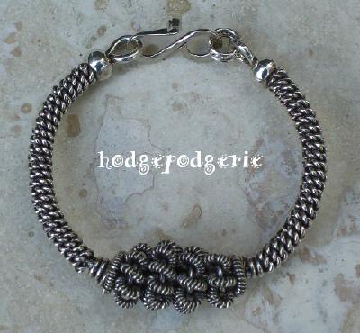 In A Coil Sterling Silver Bangle